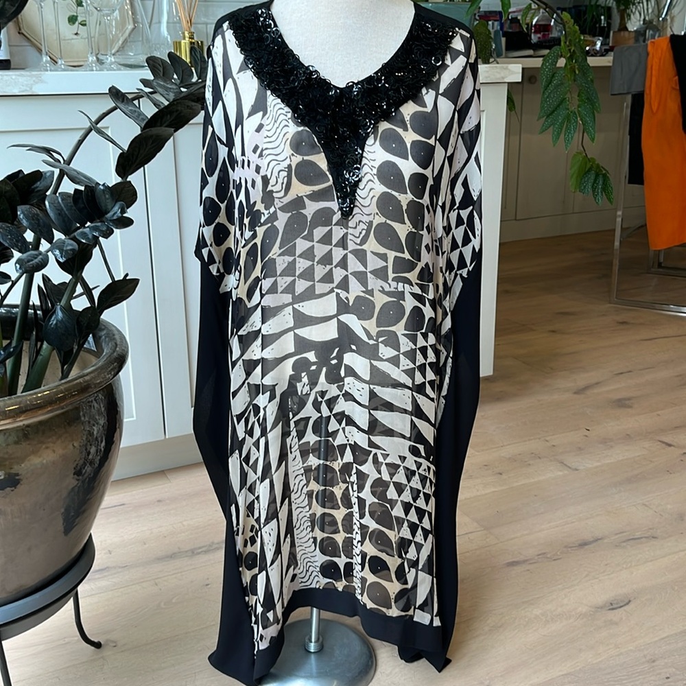 NWT Ecla 100% silk dress made in Italy.  Drop shoulder sleeveless